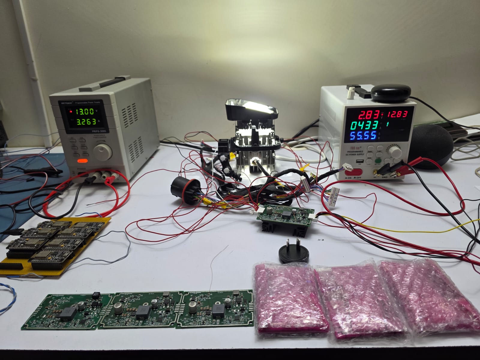 NAVFRAN-designed Head Lamp Control Unit connected to a headlamp and bench power supplies